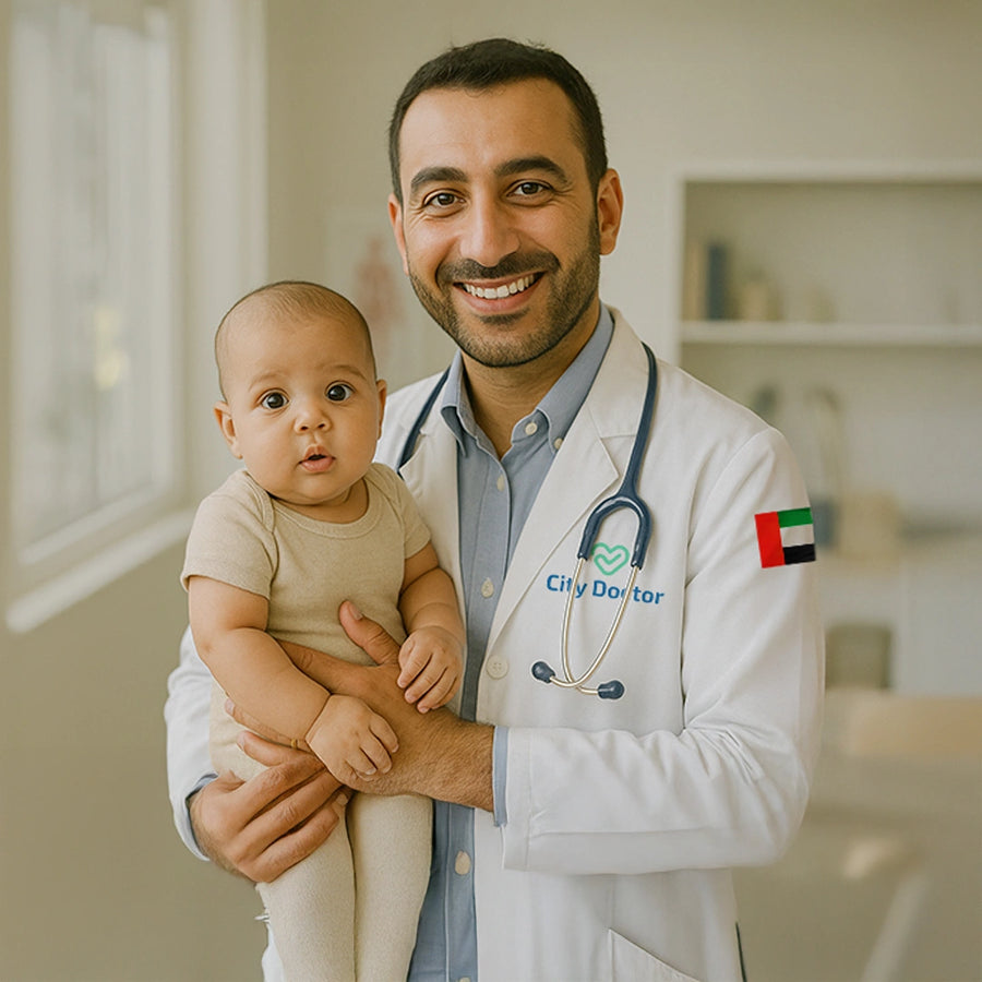 A City Doctor doctor holding a baby